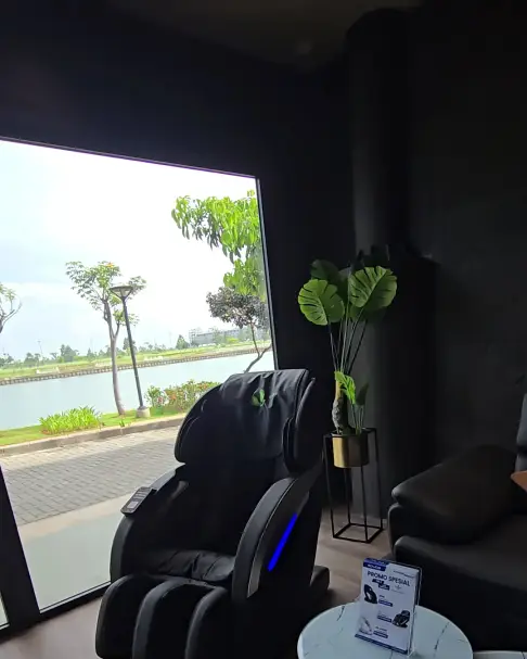 Massage chair by the window